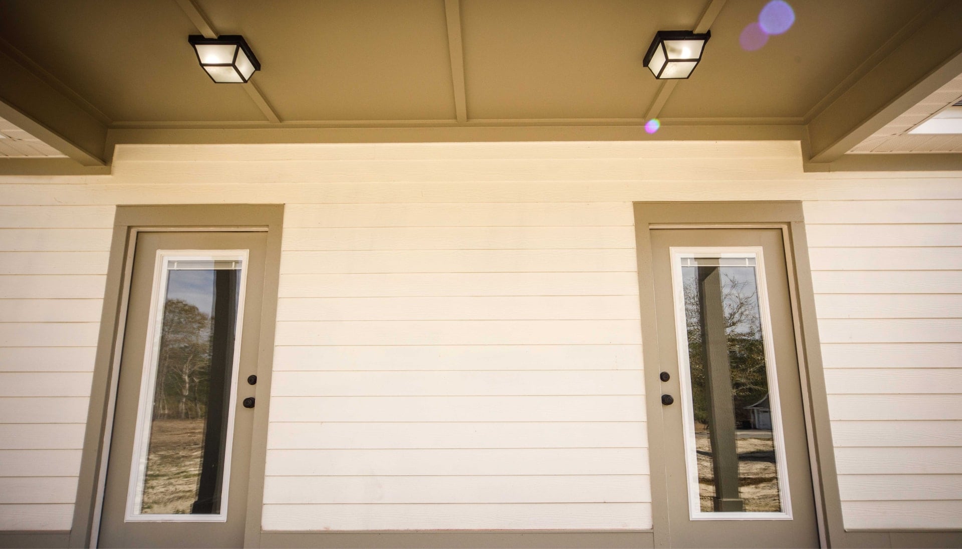 We offer siding services in Sacramento, California. Hardie plank siding installation in a front entry way.